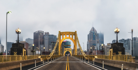 Panorama of the Roberto Clemente Bridge in the fog in Pittsburgh