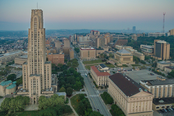 An aerial view of the Cathedral of Learning at dawn in Pittsburgh