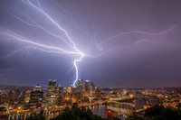 Lightning bolt hitting downtown Pittsburgh during a spring storm
