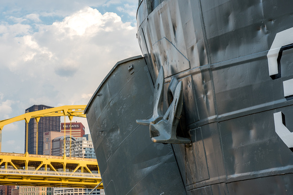 The anchor on the LST 323 World War II Transport Ship and Pittsburgh skyline