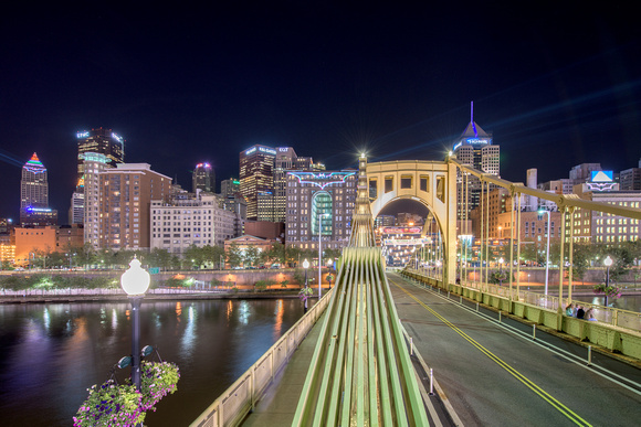 On top of the Clemente Bridge as the Bat Signals shine on Pittsburgh