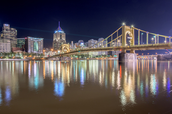 Colorful reflections of Pittsburgh and the Bat Signals