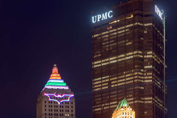 The colorful Gulf Tower and Bat Signal in Pittsburgh