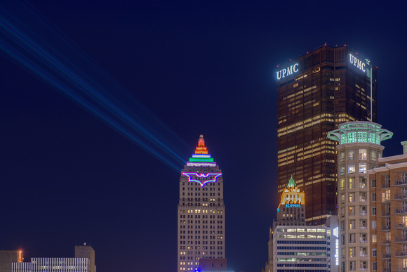 Lasers light up a Bat Signal on the Gulf Tower in Pittsburgh