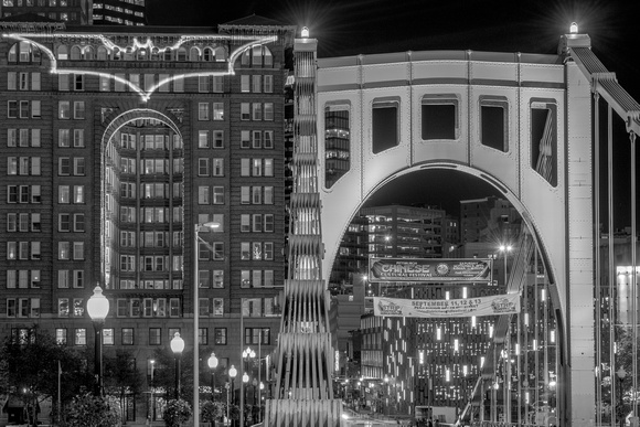 Straight on view of the Clemente Bridge and Bat Signal in B&W