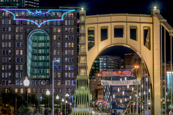 Straight on view of the Clemente Bridge and Bat Signal