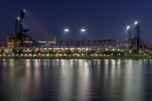 PNC Park reflects in in the Allegheny River before dawn in Pittsburgh