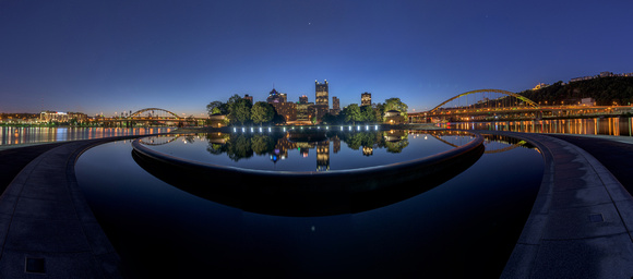 Pittsburgh reflects in the fountain at the Point before dawn