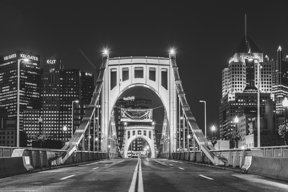 A black and white view of the Clemente Bridge