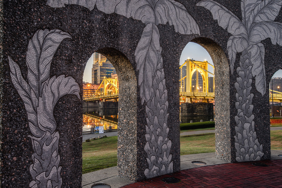 The Roberto Clemente Bridge is framed through a sculpture on the North Shore HDR