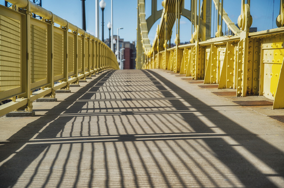 Shadows on the ground of the Roberto Clemente Bridge in Pittsburgh