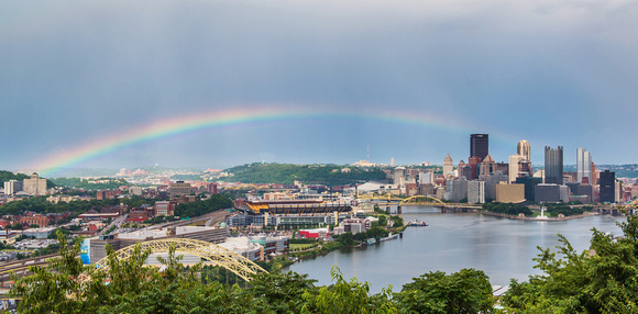 A panoramic view of a rainbow over Pittsburgh
