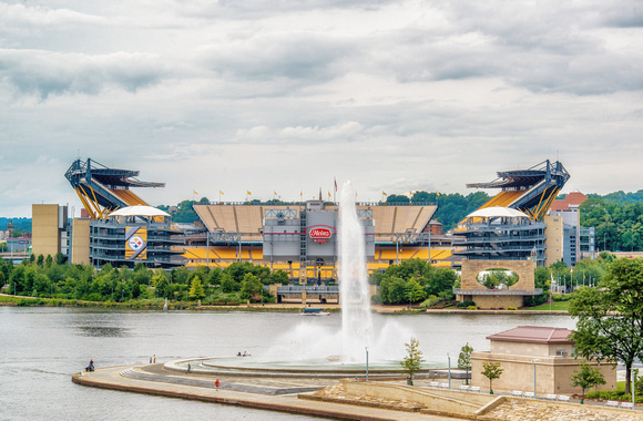 The fountain at Point State Park rises in front of Heinz Field in Pittsburgh