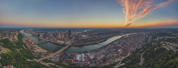 Sunrise dawns over Pittsburgh in an aerial panorama