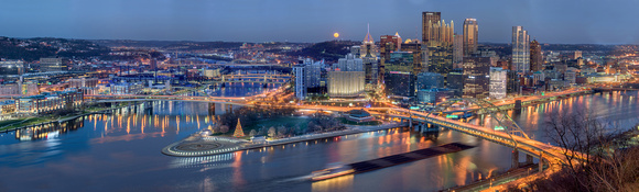 Panorama of the full moon rising in Pittsburgh in the fall