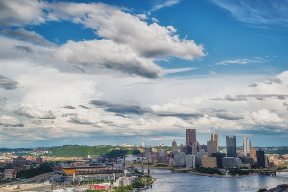 Clouds forming over the Pittsburgh skyline from the West End Overlook