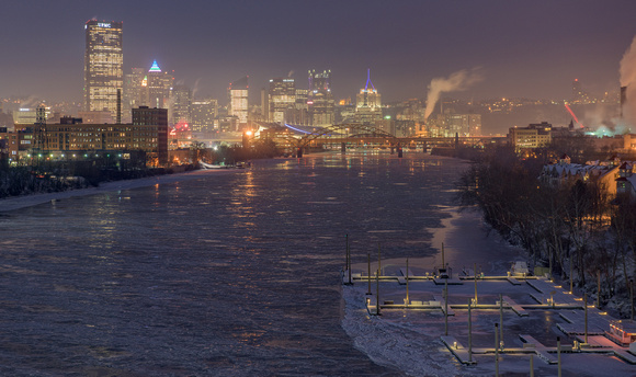 An icy Allegheny River leads into Pittsburgh