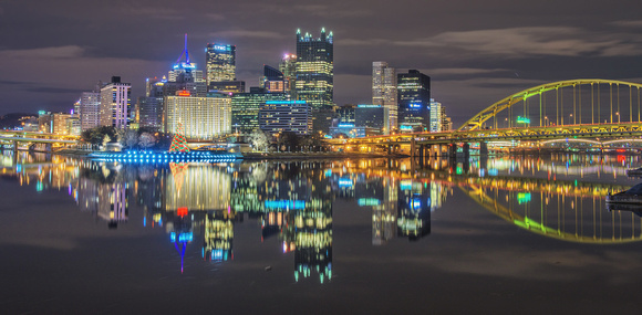 Reflections of Pittsburgh and the tree in the Ohio River