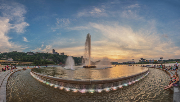 Panorama of Point State Park in Pittsburgh at dusk