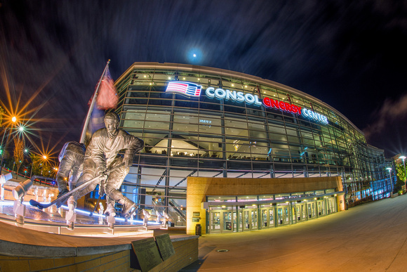 Le Magnifique, the Mario Lemieux statue shines in the night at CONSOL Energy Center