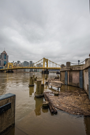 A flooded boardwalk on the North Shore of Pittsburgh