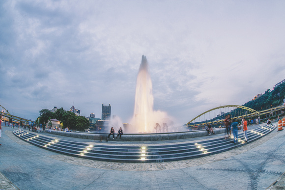 The fountain at Point State Park in Pittsburgh glows in the blue hour