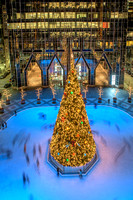 Skaters zip around the tree at PPG Place in Pittsburgh