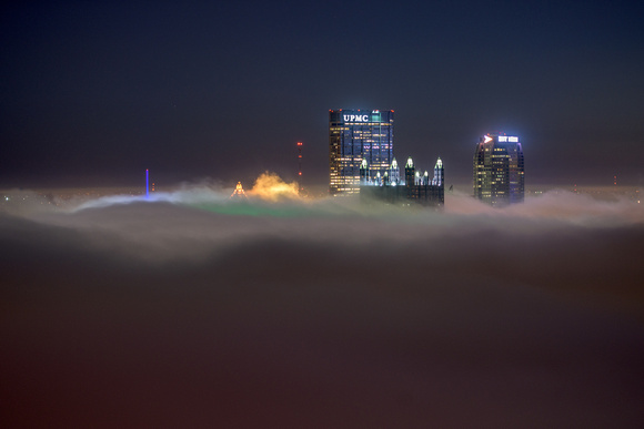 Pittsburgh rises above the fog before dawn