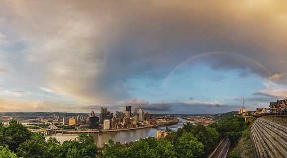 Panorama of a rainbow over Pittsburgh after a summer storm