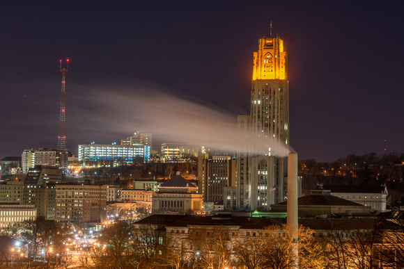 Steam in front of the Cathedral of Learning lit up by the Victory Lights