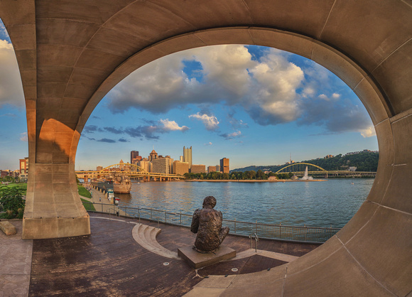 Panorama of the Mr. Rogers Statue at dusk in Pittsburgh