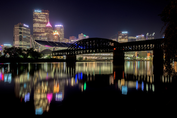 Colorful reflections of PIttsburgh in the Allegheny