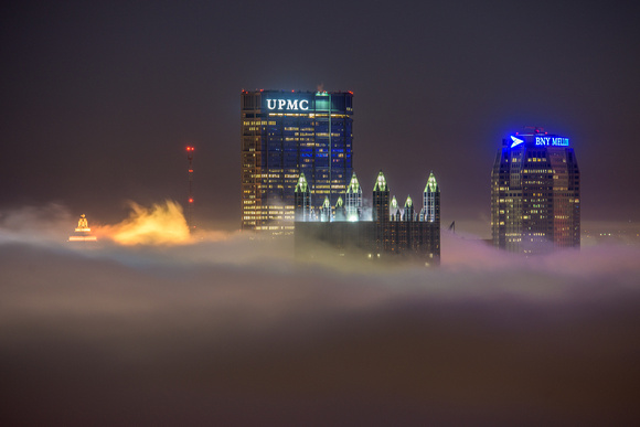 Pittsburgh lights illuminate the fog