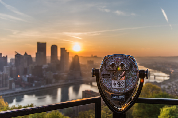 A viewfinder shines in the early morning light in Pittsburgh