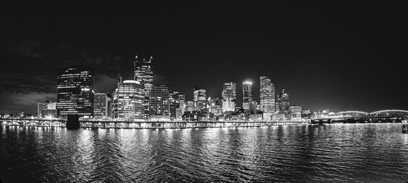 Black and white panorama of Pittsburgh from the Gateway Clipper at night