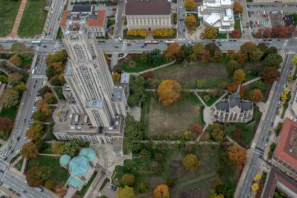 Side by side view of the Cathedral of Learning and Heinz Chapel in Pittsburgh