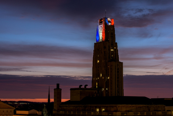 The Cathedral of Learning shines against a colorful sunrise