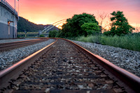 Sunlight on railroad tracks in Pittsburgh at dusk