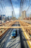 Car driving across the Brooklyn Bridge HDR