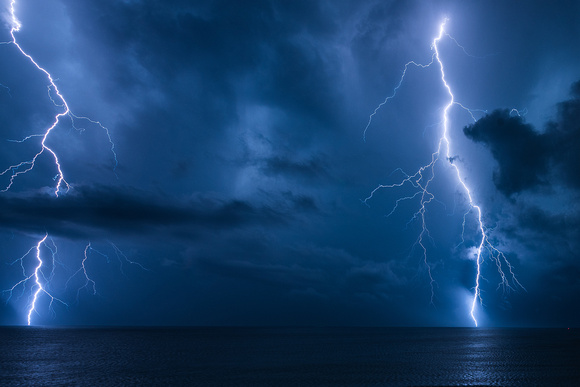 Two lightning bolts strikes the water in Ocean City, MD in this summer storm