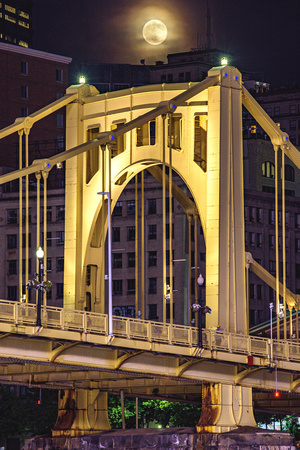 Full moon over the Clemente Bridge in Pittsburgh