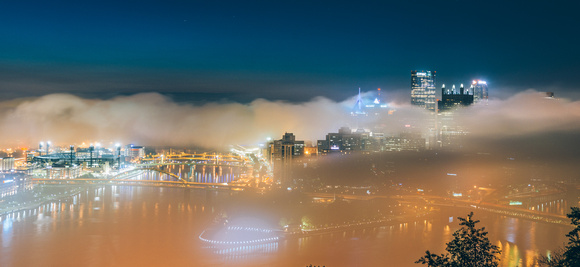 Fog engulfs the Pittsburgh skyline from Mt. Washington