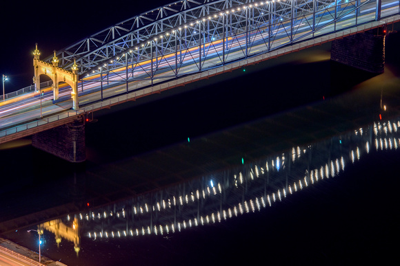 The Smithfield St. Bridge reflects int he Monongahela River in Pittsburgh in this rooftop view