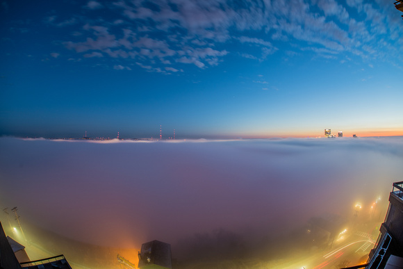Fog blankets the Pittsburgh skyline at dawn