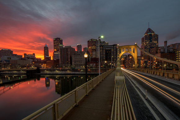 A vibrant Pittsburgh sunrise from the Clemente Bridge