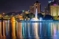 The fountain at Point State Park at the Giant Rubber Duck reflect at the Point in Pittsburgh HDR