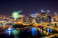 Fireworks rise above Pittsburgh after a Pirates win
