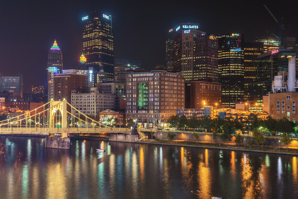 Pittsburgh skyline lit up at night from PNC Park