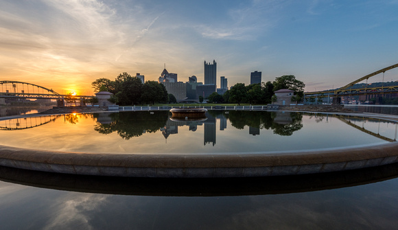 Sunrise reflects in the Point in Pittsburgh
