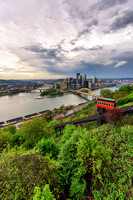 An incline climbs Mt. Washington surrounded by beautiful foliage in Pittsburgh